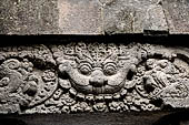 Prambanan - Candi Lara Jonggrang, makara figure as dwarapala at foot of the door 